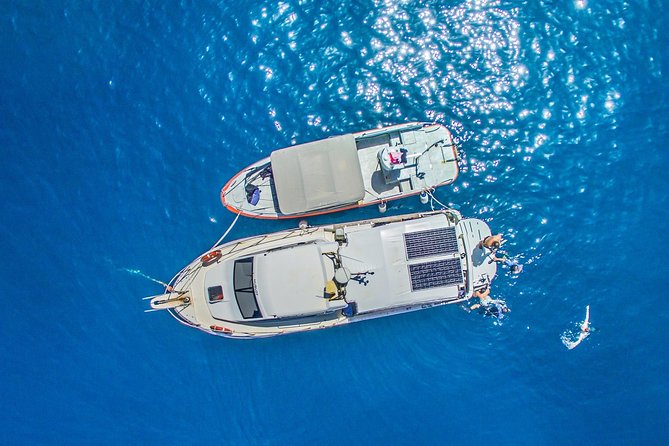 Boat Trip in Crete with Guided Snorkeling and Free Pick up! - Akrotiri Peninsula cruise and the Blue Cave glow