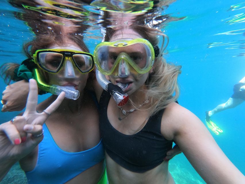 Chania: Boat Trip with Guided Snorkeling & Stand-Up Paddling - What It’s Like Onboard: Snacks, Safety Gear, and Support