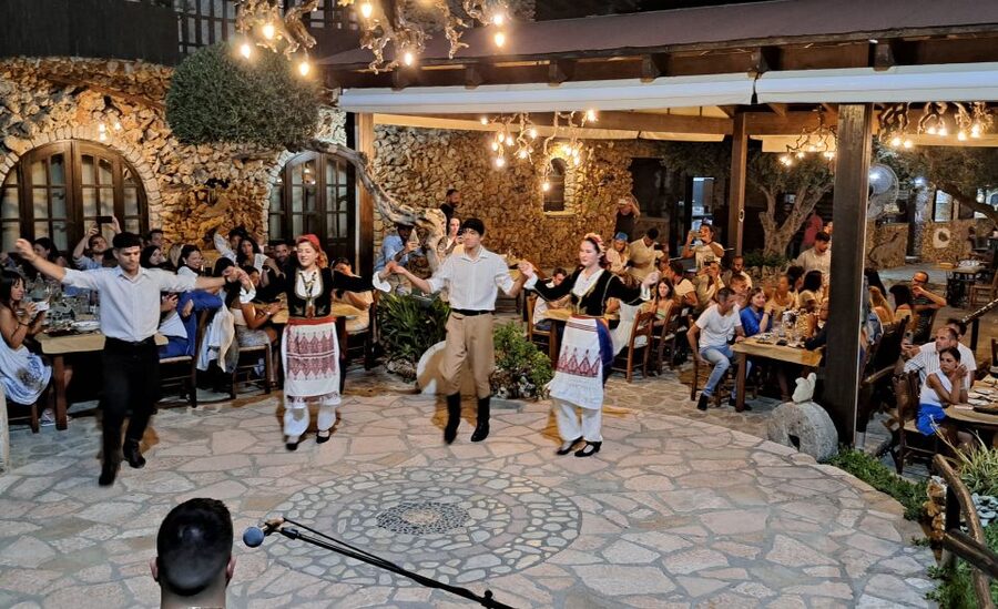 Chania: Cretan Folklore Dance Show with Dinner - The Kalyves venue stop, where the night becomes a celebration