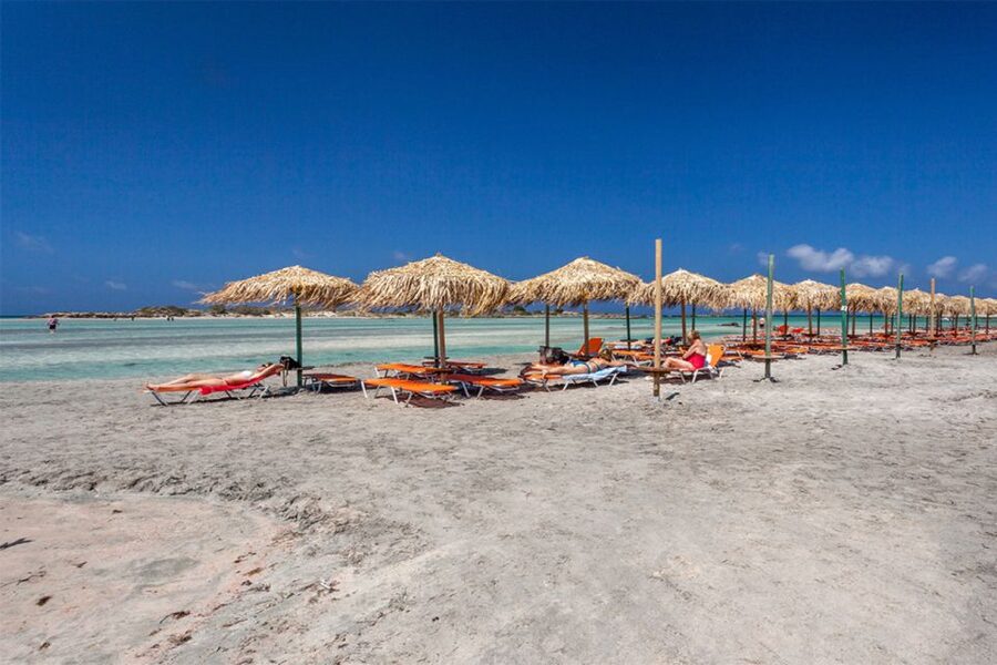 Chania: Elafonisi and Milia Mountain with Loungers and Lunch - The Elafonisi setup: pink sand, shade, and the stress removed