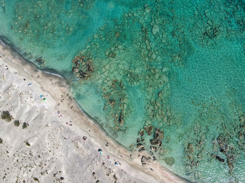 Chania: Elafonisi Bus Trip with Free Time and Stop in Elos - Arriving At Elafonisi: Setup, Walking, And Beach Basics