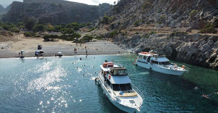 Chania: Menies Beach & Chironisia Bay Cruise with Snorkeling - Menies Beach at Ancient Diktynna: Clear Water, WWII Remains, and a Real Anchor Point