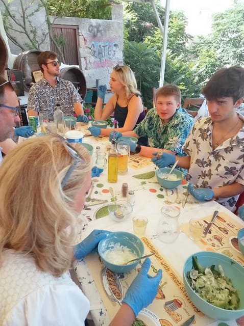 Cooking Class & Greek Night Experience - Helping feed the room, then eating your own Cretan buffet