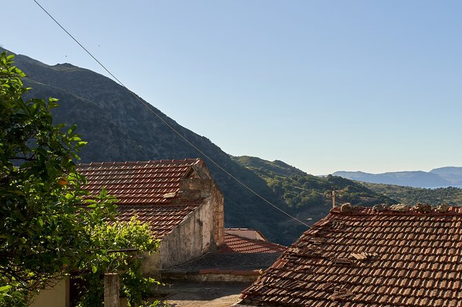 Cretan Night: Dinner & Live Show at Pano Karouzanos Village - Traditional dinner and local wine: included, simple, and satisfying