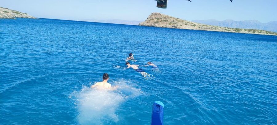 Crete: Fishing & Swimming Boat Cruise with Lunch & Drinks - Lunch Onboard: Fresh Fish, Greek Salad, and the Real Payoff