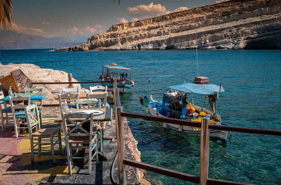 Crete: Matala Hippie Caves - Strolling Matala village, colorful homes, shops, and easy meals