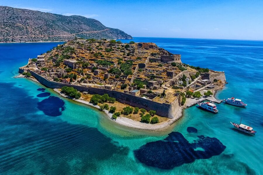 Crete: Spinalonga, Elounda, & Agios Nikolaos Boat Tour & BBQ - Why Spinalonga feels more than a stop on a map