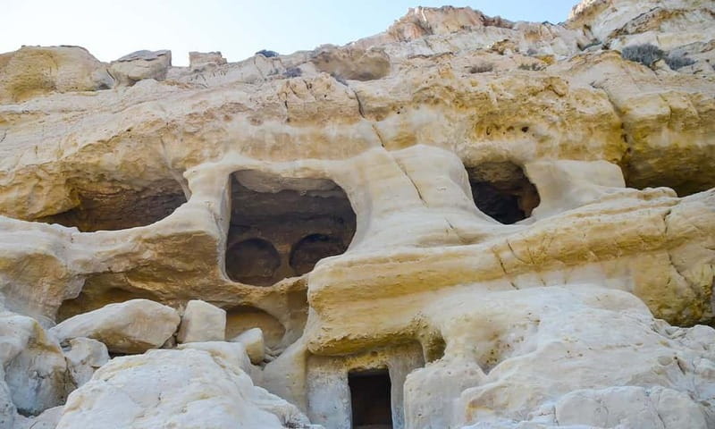 Day trip to Matala Hippie Beach & Gortyn Archaeological Site - The hippie caves: Neolithic carvings and 1960s life