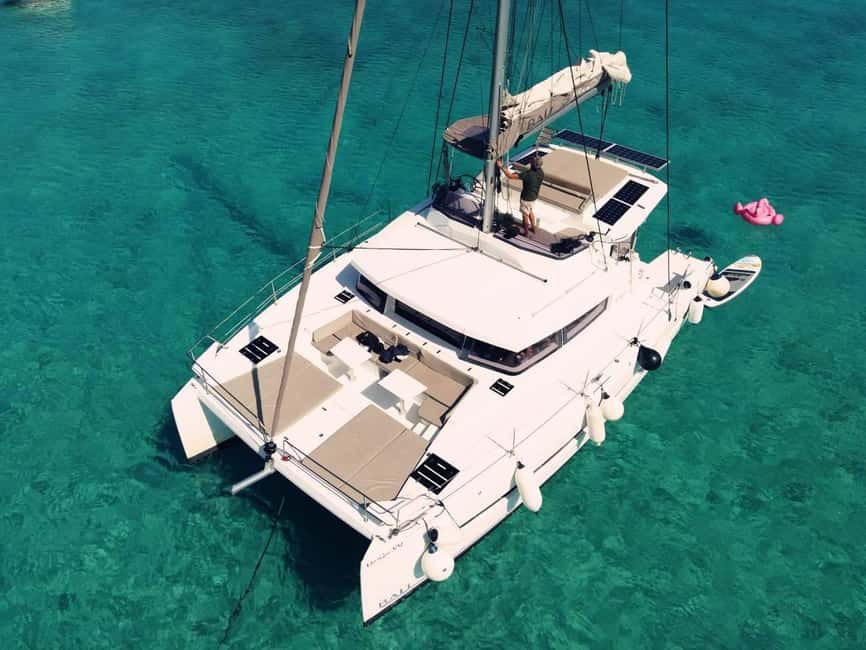 From Panormo: Luxe All-Inclusive Catamaran Cruise with Lunch - The first 15 minutes in Panormo, coffee, pies, and a proper welcome