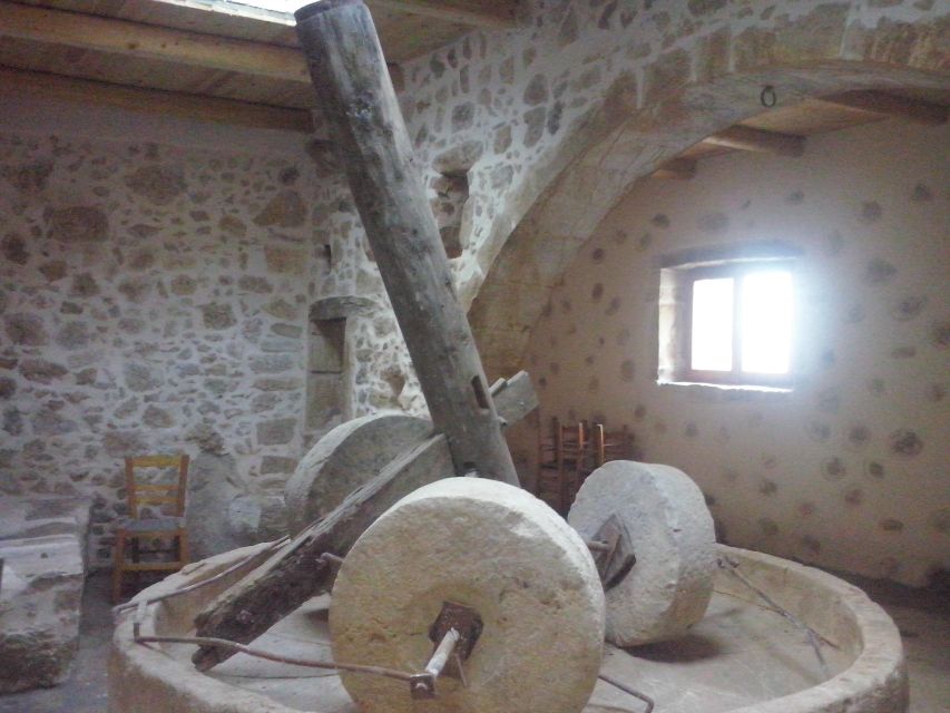 From Rethymno: Arkadi, Melidoni, and Margarites Tour - Lunch at the family taverna: live music, dancing, and cash planning