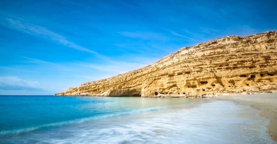 Heraklion: Matala Beach, Hippie Caves & Odigitria Monastery - Matala Beach, where the 60s still shape the vibe
