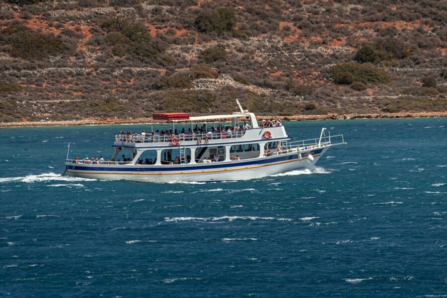 Heraklion: Spinalonga, Agios Nikolaos, & Elounda Boat Tour - Crossing Mirabello Bay to Spinalonga: the ride that sets the mood