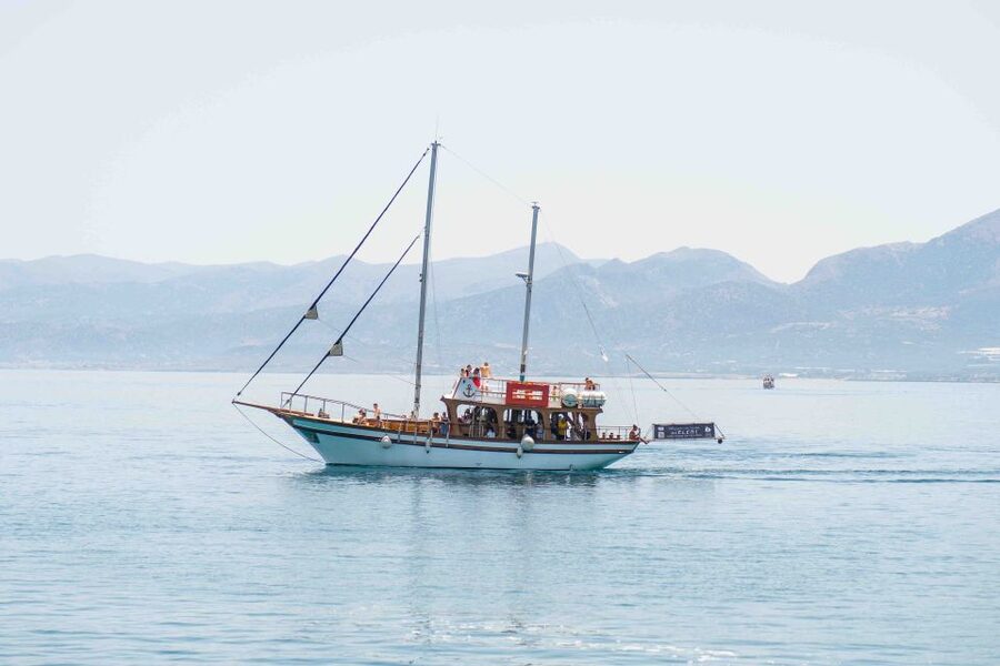 Hersonisos: Boat Cruise with Swim Stops and Lunch - Getting On the Eleni Boat at Port of Hersonissos