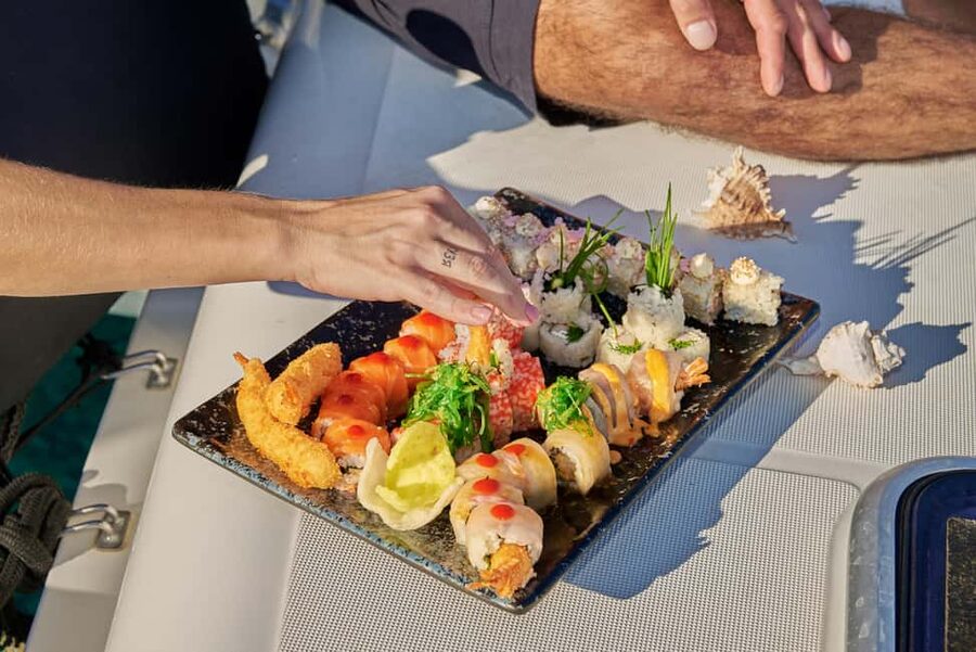 Hersonissos: Sunset Catamaran Cruise with Snacks and Drinks - Golden hour schedule: from port aperitif to the Agios Georgios Bay swim stop