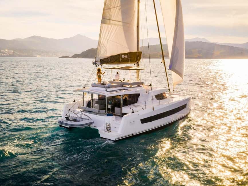 Panormo: Sunset All-Inclusive Catamaran Cruise with Snacks - A 3.5-hour Panormo sunset on a modern catamaran