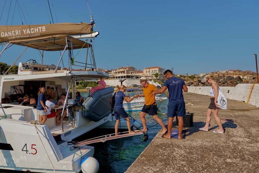 Panormo: Sunset All-Inclusive Catamaran Cruise with Snacks - Boarding in Panormo: DanEri flag, 15-minute timing, and parking that helps