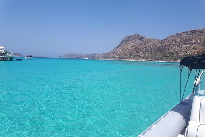Private Boat Trip Kissamos Balos (price per group - up to 10 people) - Snorkeling gear, water, and what comfort can look like on board