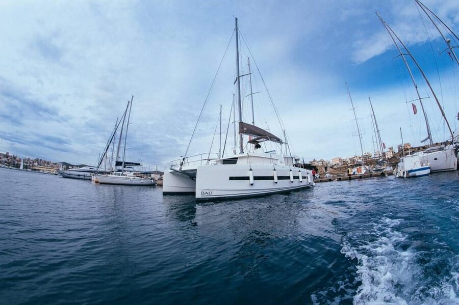 Sunset Cruise from Hersonissos port to St. Georgios bay - Light dinner on board with Cretan-style flavors, plus white wine, beer, and raki
